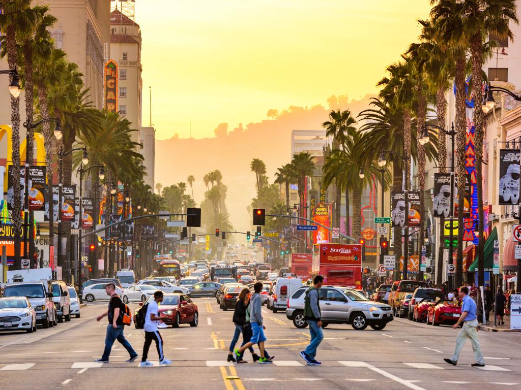 People and cars on Hollywood Boulevard's Theater District in Los Angeles, California