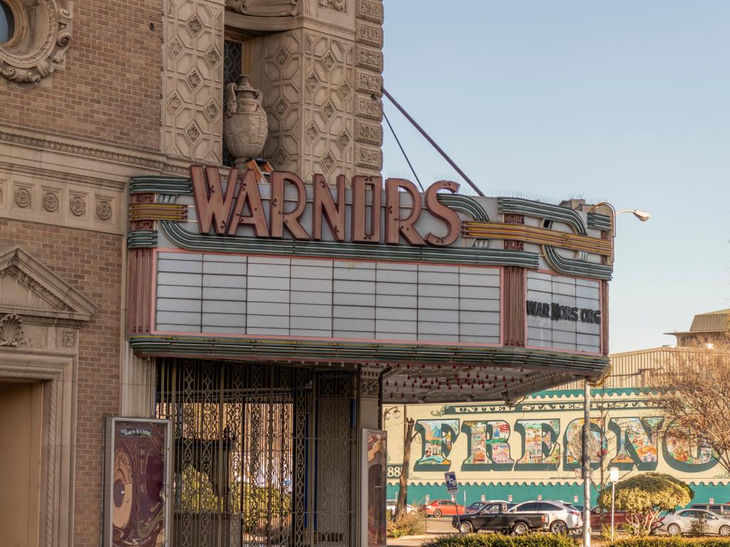 Ornate facade of Warnors Theatre and the Fresno Postage Stamp Mural, in the Mural District, Downtown Fresno, California