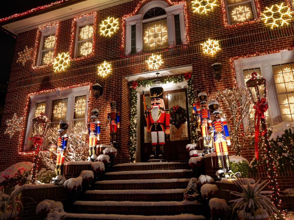 Lit up snow and nutcracker decorations at Dyker Heights