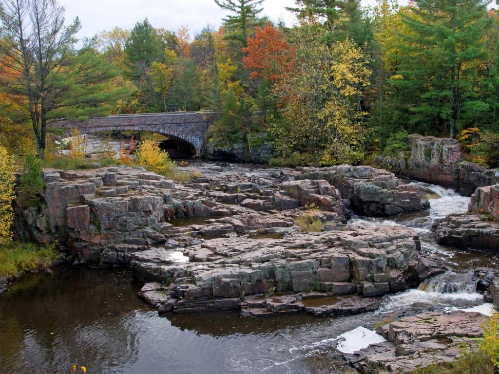 Eau Claire, Wisconsin, USA taken as a shot of the Dells of the Eau Claire, a spectacular series of small waterfalls between the rocks of a natural rock garden located in northern Wisconsin. Shot during the beauty of autumn.